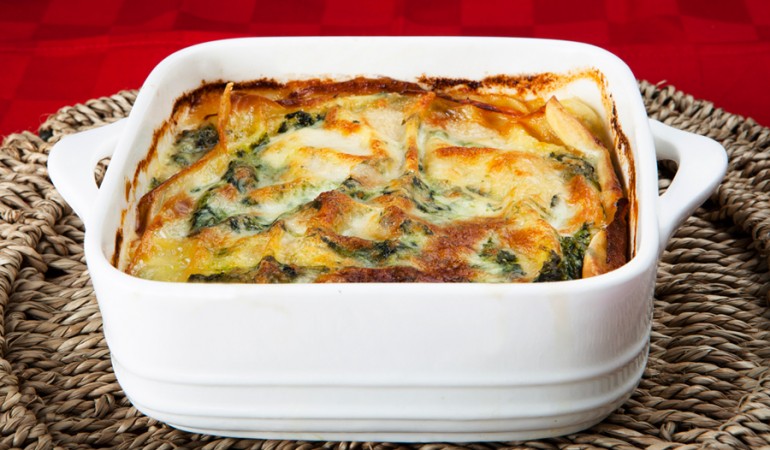 Pasticcio di crêpes con ricotta e spinaci